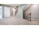 Upstairs hallway with carpeted floor at 105 Clarendon St # E, Mooresville, NC 28117