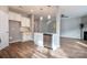 Kitchen with island, stainless steel dishwasher, and granite countertops at 105 Clarendon St # E, Mooresville, NC 28117