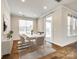 Bright dining room with hardwood floors and sliding glass door to patio at 1056 Emory Ln, Fort Mill, SC 29708