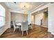 Bright dining room with hardwood floors and statement wall at 1056 Emory Ln, Fort Mill, SC 29708