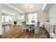 Formal dining room with hardwood floors and a statement wall at 1056 Emory Ln, Fort Mill, SC 29708