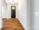 Elegant entryway with hardwood floors and wainscoting at 1056 Emory Ln, Fort Mill, SC 29708