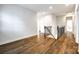 Upstairs hallway with hardwood floors and iron railing at 1056 Emory Ln, Fort Mill, SC 29708