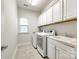 Laundry room with washer, dryer, and cabinets at 1056 Emory Ln, Fort Mill, SC 29708