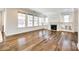 Living room with hardwood floors, fireplace, and built-ins at 1056 Emory Ln, Fort Mill, SC 29708