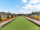 Well-maintained bocce ball court in a community setting at 1115 Millview Ln, Matthews, NC 28104