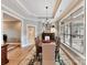 Elegant dining room with hardwood floors, chandelier, and large windows at 1115 Millview Ln, Matthews, NC 28104