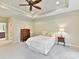 Main bedroom with ensuite bathroom access and ceiling fan at 1115 Millview Ln, Matthews, NC 28104