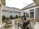 Private patio with seating area and grill, perfect for outdoor entertaining at 1115 Millview Ln, Matthews, NC 28104