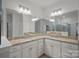 Double vanity bathroom with granite countertop and shower at 116 Van Gogh Trl, Mount Holly, NC 28120