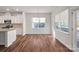 Bright dining area with hardwood floors and access to backyard at 116 Van Gogh Trl, Mount Holly, NC 28120