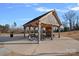 Community gazebo with picnic tables for outdoor gatherings at 116 Van Gogh Trl, Mount Holly, NC 28120