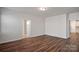 Spacious living area featuring hardwood floors and an open layout at 116 Van Gogh Trl, Mount Holly, NC 28120