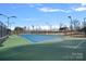 Tennis court with surrounding green space at 116 Van Gogh Trl, Mount Holly, NC 28120