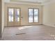 Bright and spacious living room with large windows and double doors at 1212 Donna Dr, Shelby, NC 28152