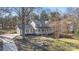 Two-story house with gray siding, porch, and a landscaped yard at 13010 Marlstone Ln, Charlotte, NC 28215