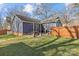 Private backyard with patio and wooden fence at 1334 Woodland Dr, Charlotte, NC 28205