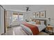 Spacious bedroom with a king-size bed, barn door, and natural light at 1334 Woodland Dr, Charlotte, NC 28205