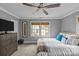 Spacious bedroom with ceiling fan and dresser at 1334 Woodland Dr, Charlotte, NC 28205