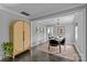 Elegant dining room with modern light fixture and dark hardwood floors at 1334 Woodland Dr, Charlotte, NC 28205