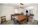 Bright dining room featuring a wood table and chandelier at 1346 5Th Street Nw Cir, Hickory, NC 28601