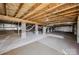 Unfinished basement with exposed beams and plumbing at 1417 Wildwood Dr, Kannapolis, NC 28081