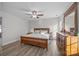 Bedroom with wooden bed frame and dresser at 1417 Wildwood Dr, Kannapolis, NC 28081