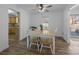 Bright dining room with wood floors and kitchen view at 1417 Wildwood Dr, Kannapolis, NC 28081