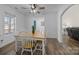 Dining room with wood floors and access to kitchen at 1417 Wildwood Dr, Kannapolis, NC 28081