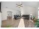 Spacious living room with vaulted ceiling, fireplace, and hardwood floors at 1417 Wildwood Dr, Kannapolis, NC 28081