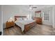 Spacious bedroom with light wood furniture and wood-look floors at 1417 Wildwood Dr, Kannapolis, NC 28081