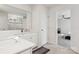 Elegant bathroom with double vanity and large mirror at 146 Dogwood Grove Pl, Troutman, NC 28166