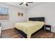 Spacious bedroom with a king-size bed and wood-look floors at 146 Dogwood Grove Pl, Troutman, NC 28166