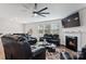 Open living room with fireplace and recessed lighting at 146 Dogwood Grove Pl, Troutman, NC 28166