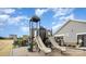 Community playground with slides and climbing structures at 146 Dogwood Grove Pl, Troutman, NC 28166