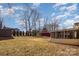 Backyard with screened porch, shed, and mature trees at 2465 Cedar Valley Dr, Conover, NC 28613