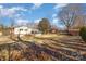 Large backyard, partially fenced, with a shed at 2465 Cedar Valley Dr, Conover, NC 28613