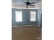 Spacious bedroom with ceiling fan and neutral carpeting at 250 Bost Rd, China Grove, NC 28023