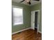 Charming bedroom with wood flooring and closet at 250 Bost Rd, China Grove, NC 28023