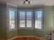 Bright breakfast nook with bay window and hardwood floors at 250 Bost Rd, China Grove, NC 28023