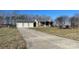 Ranch home with three-car garage and long driveway at 250 Bost Rd, China Grove, NC 28023