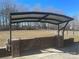 Outdoor brick barbecue area with a pergola at 250 Bost Rd, China Grove, NC 28023