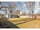 Large backyard featuring a gray house and wooden fence at 2514 Ringwood St, Charlotte, NC 28208