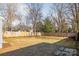 Backyard with wooden fence and grassy area at 2514 Ringwood St, Charlotte, NC 28208