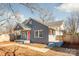 Gray house with pink door and a walkway at 2514 Ringwood St, Charlotte, NC 28208