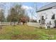 Landscaped backyard with a white picket fence at 2633 Jb Denton Rd, Lancaster, SC 29720