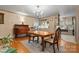 Dining room with hardwood floors, chandelier and open kitchen at 2633 Jb Denton Rd, Lancaster, SC 29720