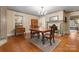 Formal dining room with hardwood floors, chandelier, and fireplace at 2633 Jb Denton Rd, Lancaster, SC 29720