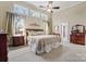 Main bedroom with high ceilings, large windows, and ceiling fan at 2633 Jb Denton Rd, Lancaster, SC 29720