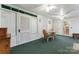 Charming sunroom with a glass-top table and wicker chairs at 2633 Jb Denton Rd, Lancaster, SC 29720